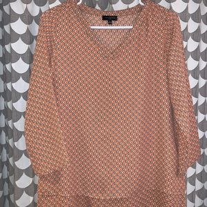 Orange/coral & grey blouse. Flowing material.